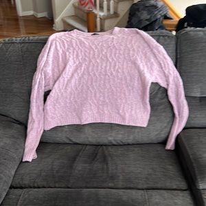 Purple sweater size XXL.